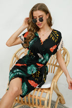 Load image into Gallery viewer, Printed Surplice Neck Short Sleeve Side Tie Mini Dress
